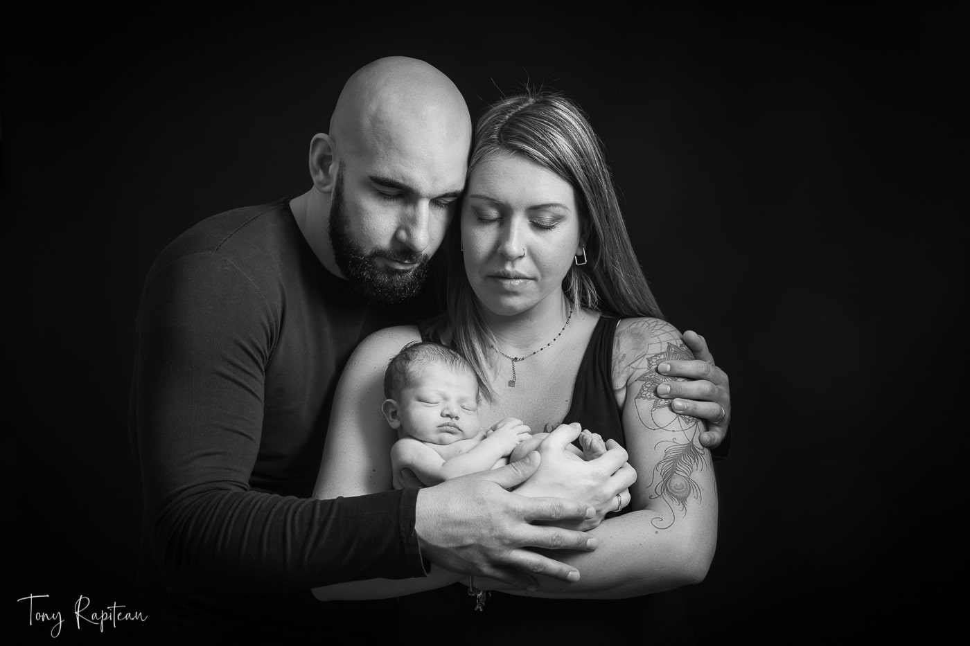 Magnifique photo de naissance avec les parents